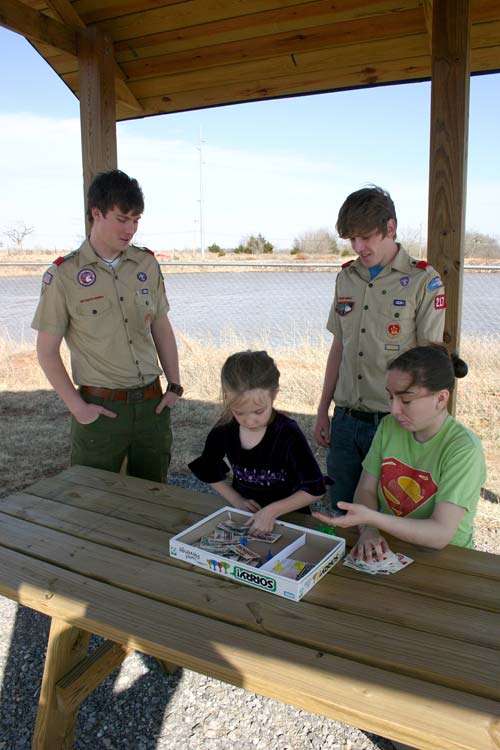 Kali Spencer and her direct care specialist, Savannah Judd with Eagle Scout candidates Eric Oliver and Michael Downs