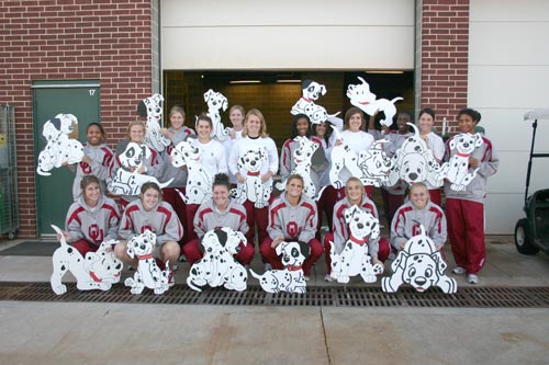 OU Women's Soccer Team Paint Dalmatians for the McCarty Center