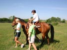 Image of a Patient Riding a Horse