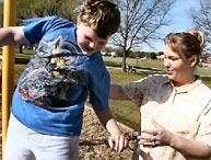 Image of a Volunteer with a Child